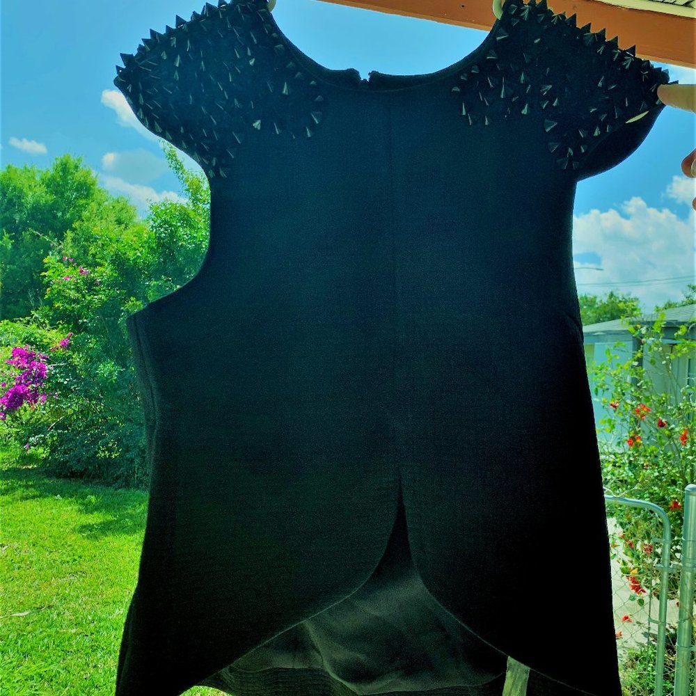 Cameo top< size small black with spikes on the shoulders